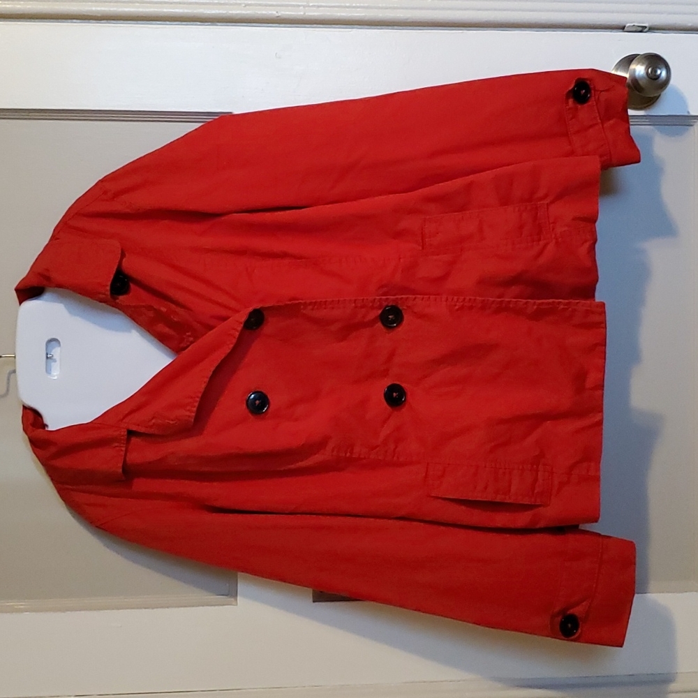 Red waist level trenchcoat